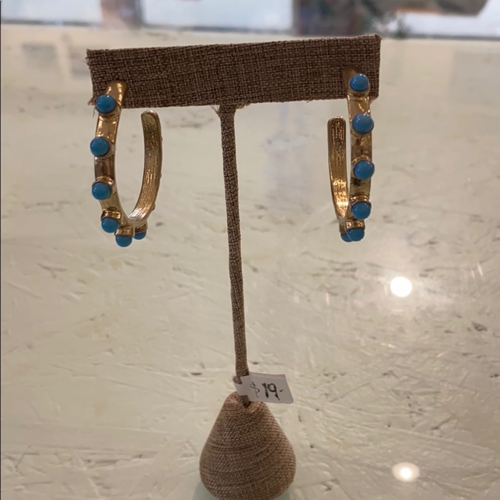 Hoop earrings with stone accent and gold tone